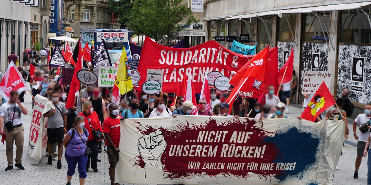 „Die Reichen sollen die Krise bezahlen” Fotos und Bericht vom Aktionstag